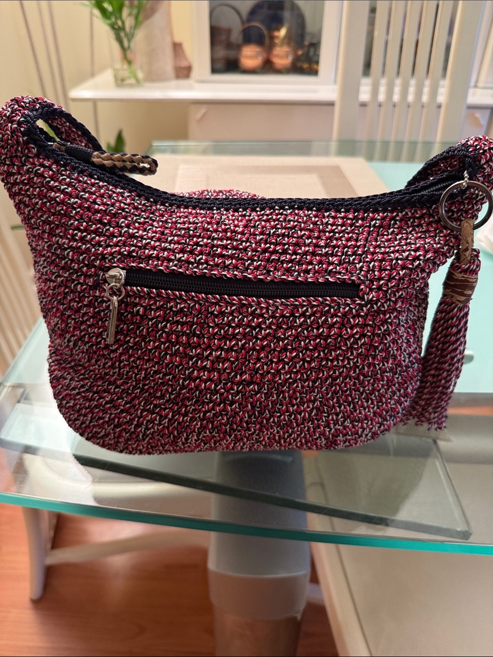 The Sak Woven Crossbody Bag in Burgundy and Black
